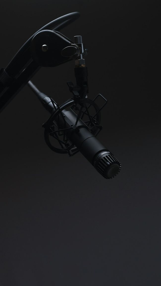 black microphone in dimmed room black microphone in dimmed room